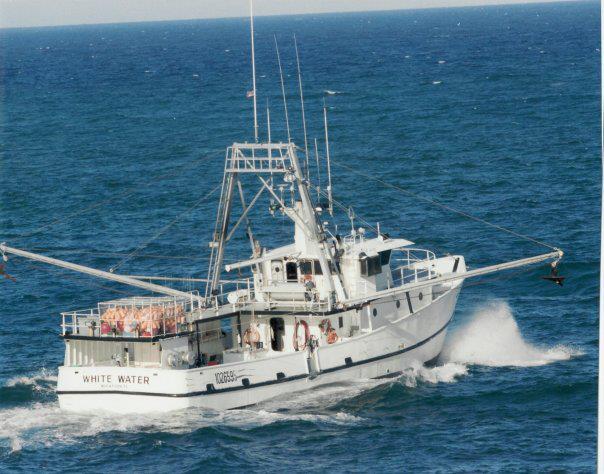 a white commercial fishing boat